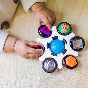 Jucarie bebelus Baby Einstein Curiosity Clutch Twist and Pop